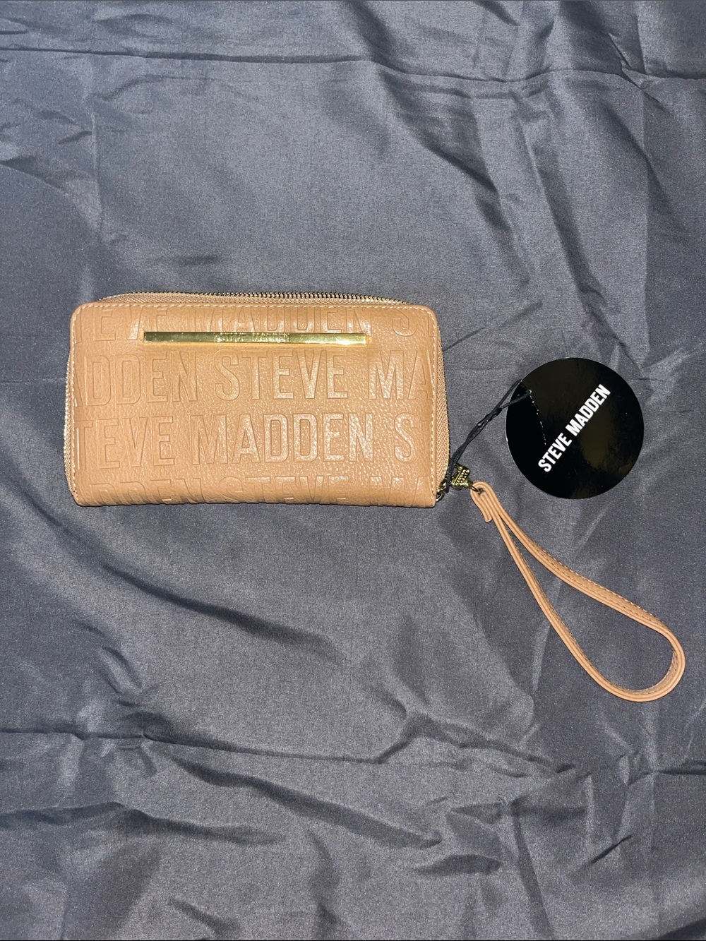 Steve Madden Taupe Embossed Logo Wristlet with Gold Bar